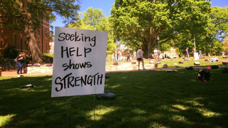 Seeking Help Shows Strength sign on the quad