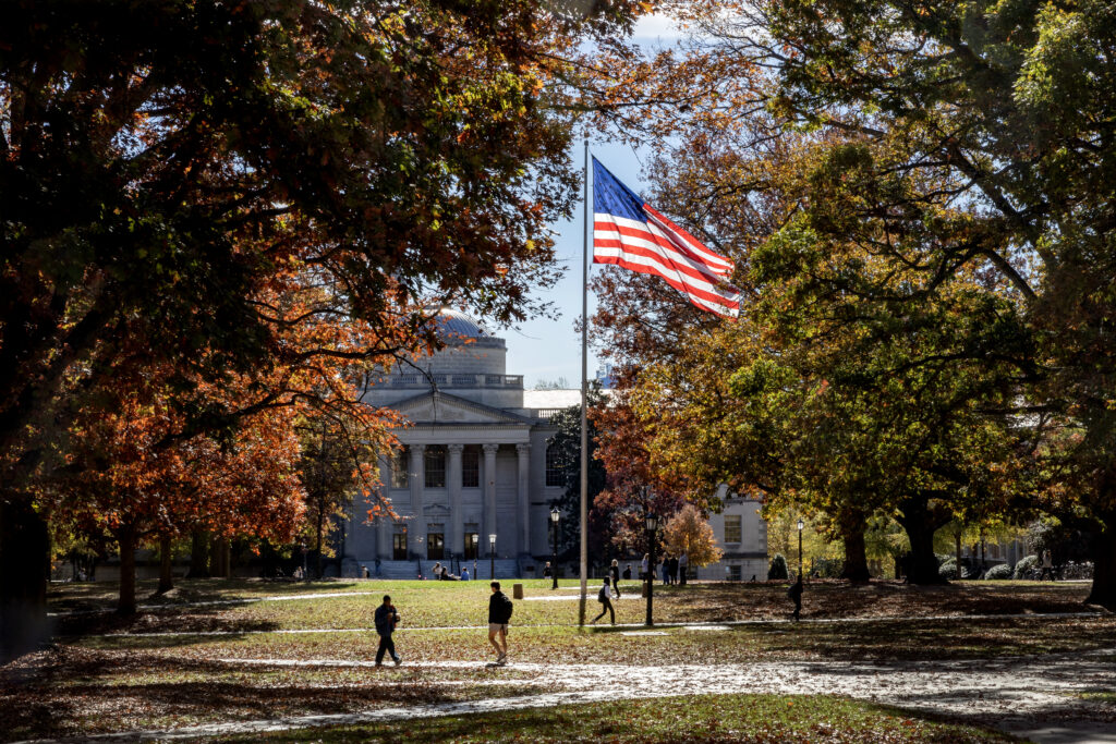 The U.S. flag flies over Polk Place